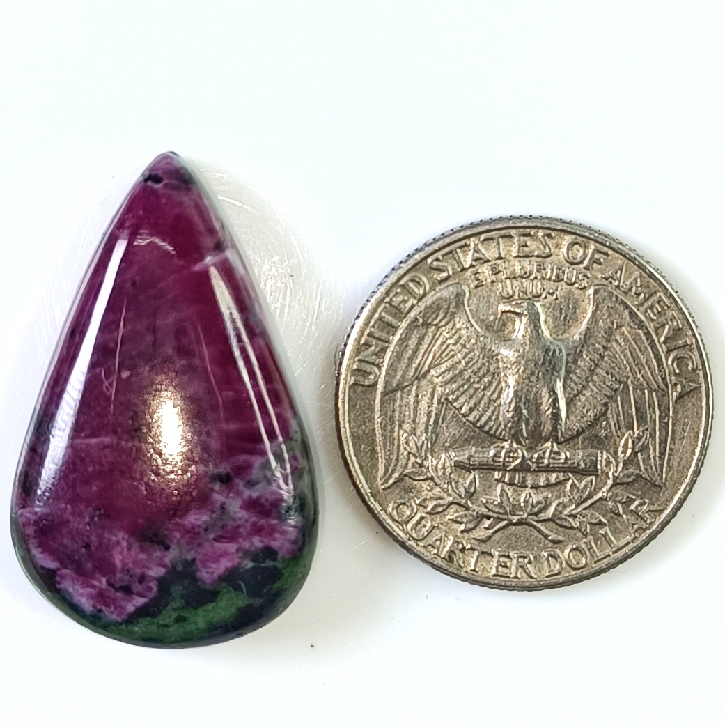 Natural Ruby in Zoisite cabochon gemstone with red ruby crystals in green zoisite, polished dome, 7x19x31mm for jewelry making.