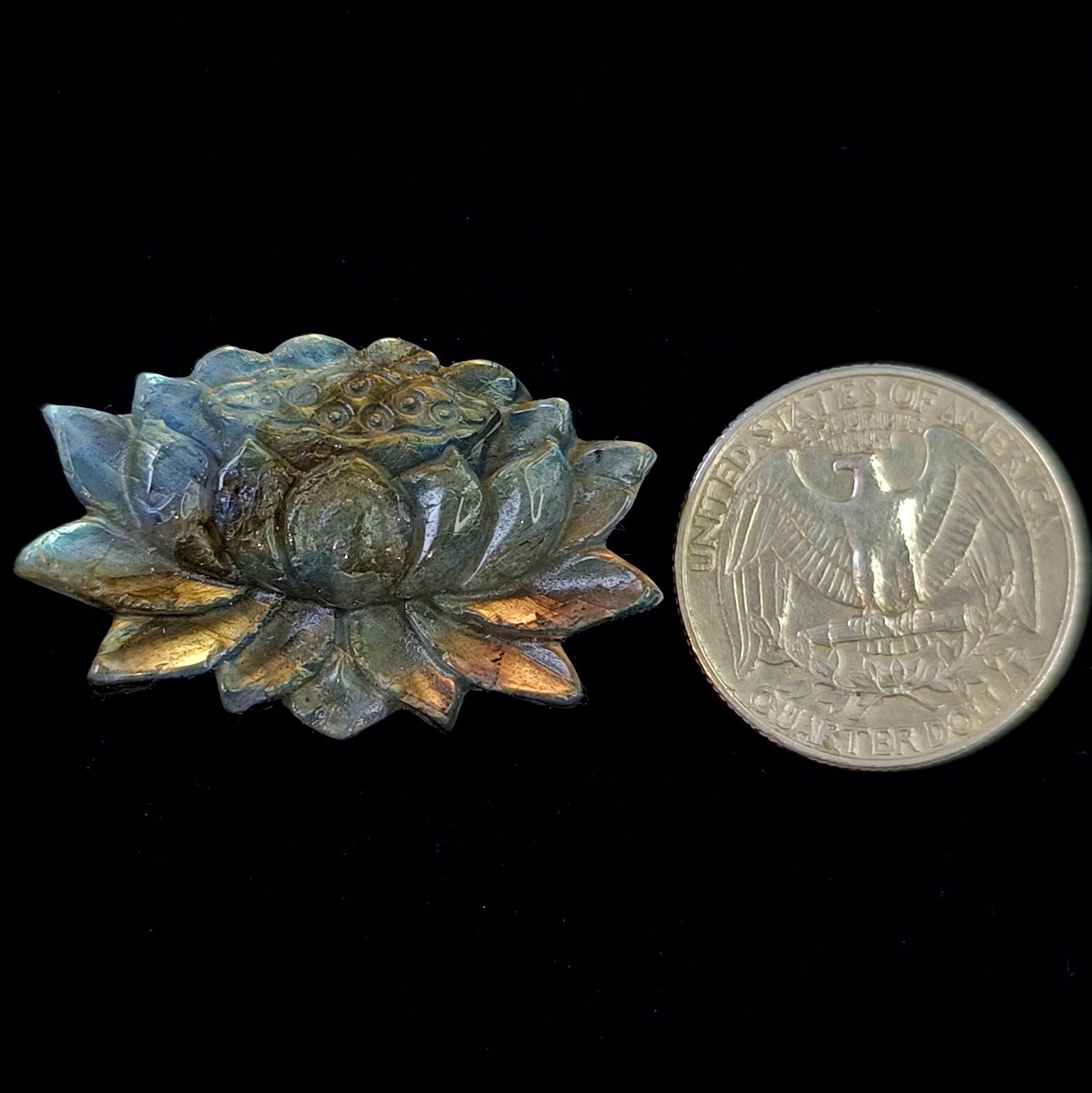 arved Labradorite Lotus 47×38mm hand-carved gemstone with blue and golden flashes, symbol of purity and spirituality.
