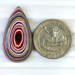 Fordite Cabochon 34×18mm oval multicolored layered gemstone for jewelry making and collections.