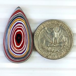 Fordite Cabochon 34×18mm oval multicolored layered gemstone for jewelry making and collections.