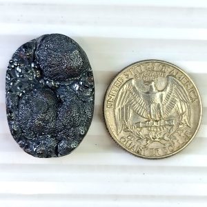 Botryoidal Hematite 29×21mm polished cabochon with metallic luster and natural bubble-like surface.